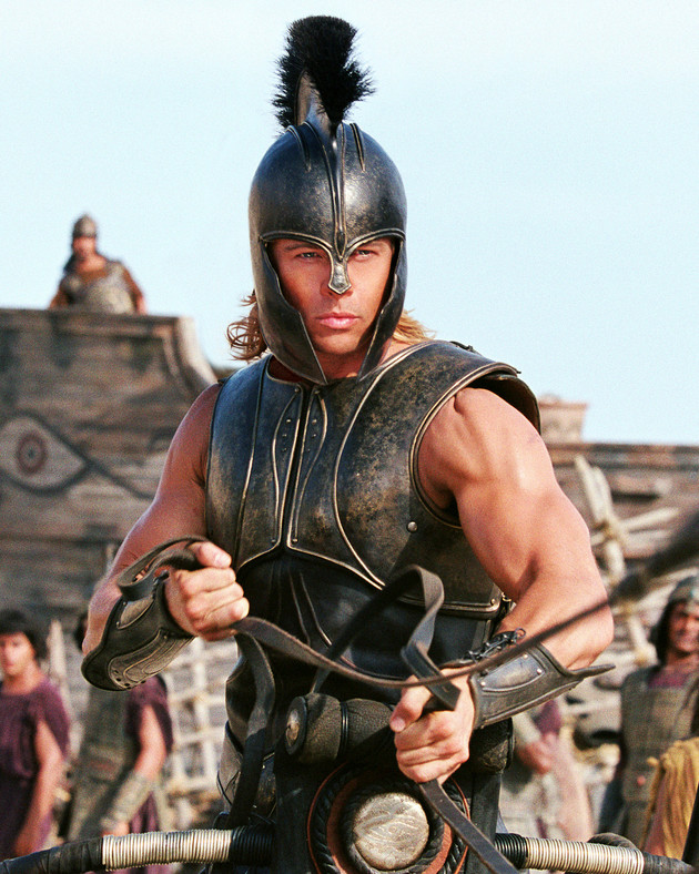 Brad Pitt, who plays Achilles in Troy, standing in full armor.