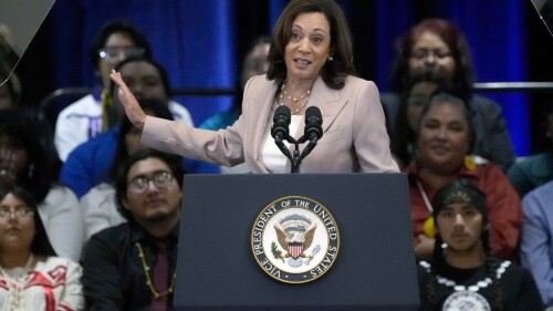 FILE - Vice President Kamala Harris speaks to the Gila River Indian community, July 6, 2023, in Phoenix.  Harris said Tuesday the government plans to cap how much families pay for childcare under the Child Care & Development Block Grant program.  (AP Photo/Rick Scuteria, Files)